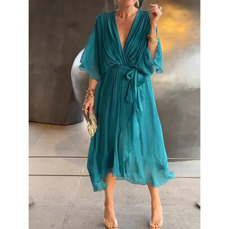 Whisper Fold Dress of breezy shape and summer rhythm