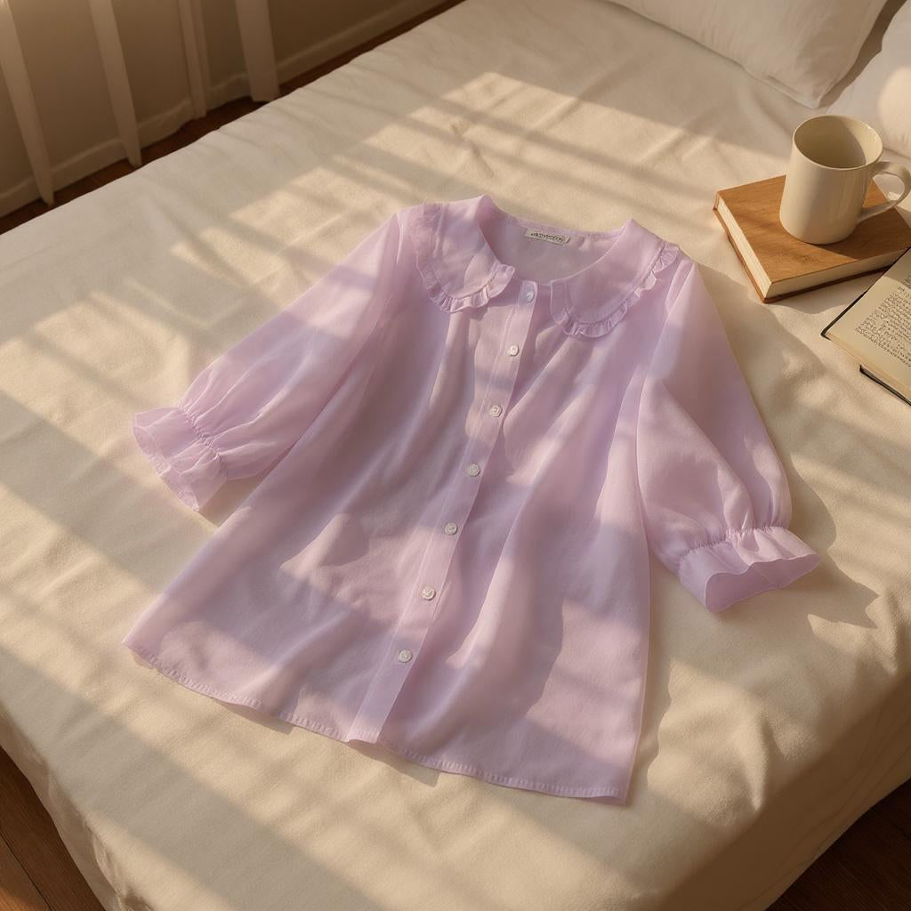 Velina Soft Blouse with delicate sleeves and timeless elegance