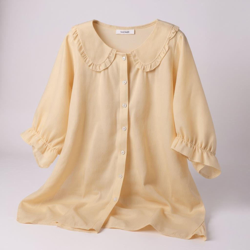 Velina Soft Blouse with delicate sleeves and timeless elegance