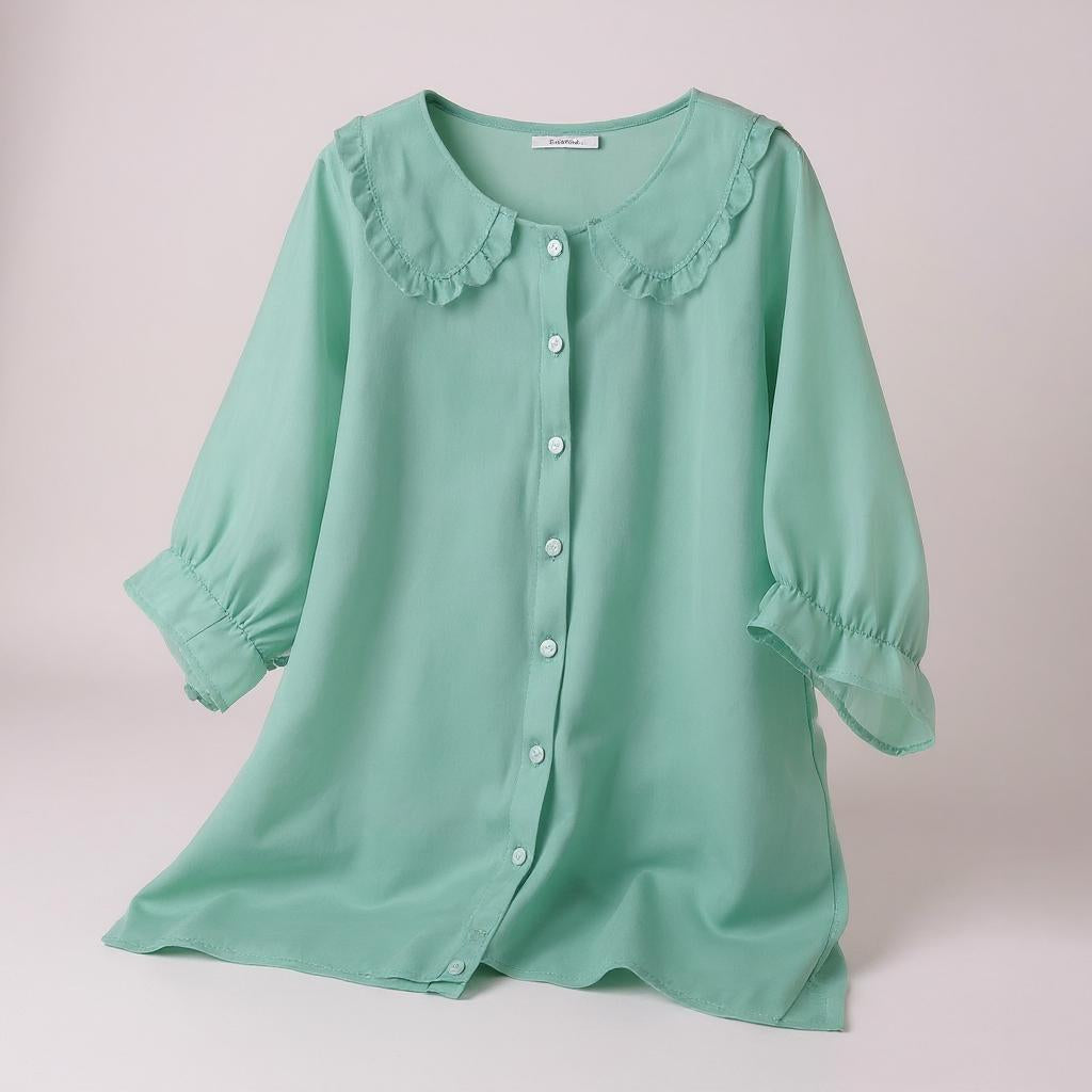 Velina Soft Blouse with delicate sleeves and timeless elegance
